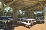 Shaded picnic area with tables